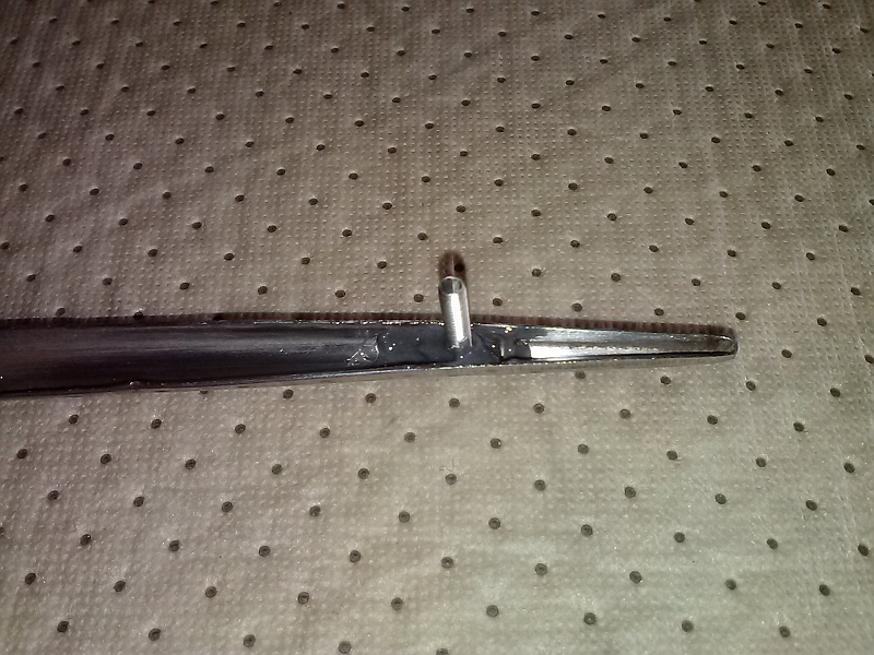 fitted a small machine screw in end of trim to fix problem