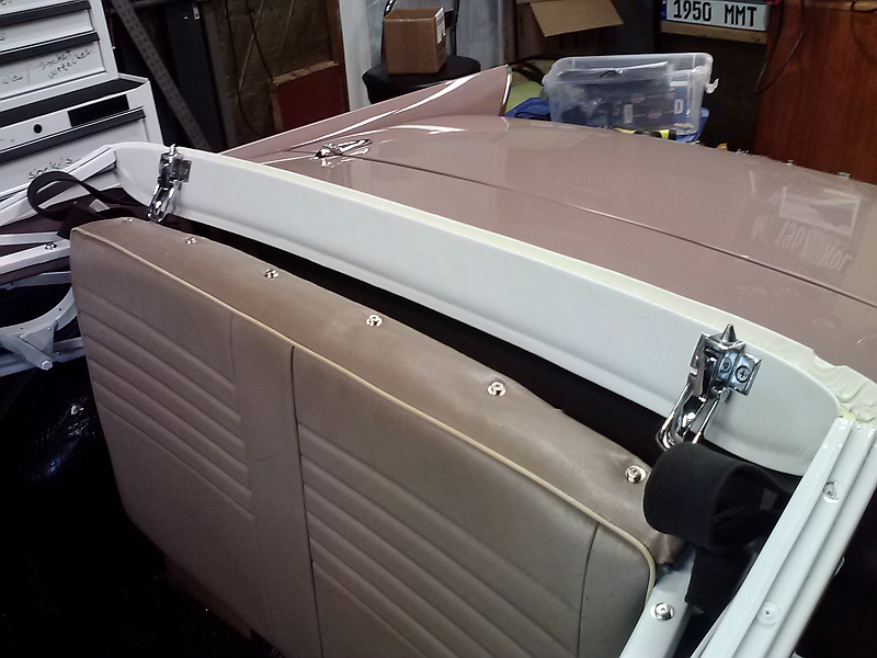 hood frame with covering vinyl glued in place