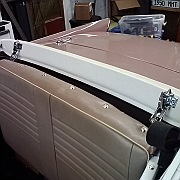 hood frame with covering vinyl glued in place